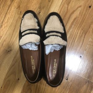 Andre Assous Black Leather “Porsha” Loafer topped with faux fur shearling
